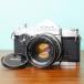 [ прекрасный товар ] исправно работающий товар * Konica AUTOREX 52mm F1.8 половина размер #35