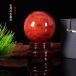  red crystal Power Stone crystal sphere feng shui .. thing wooden pedestal attached 