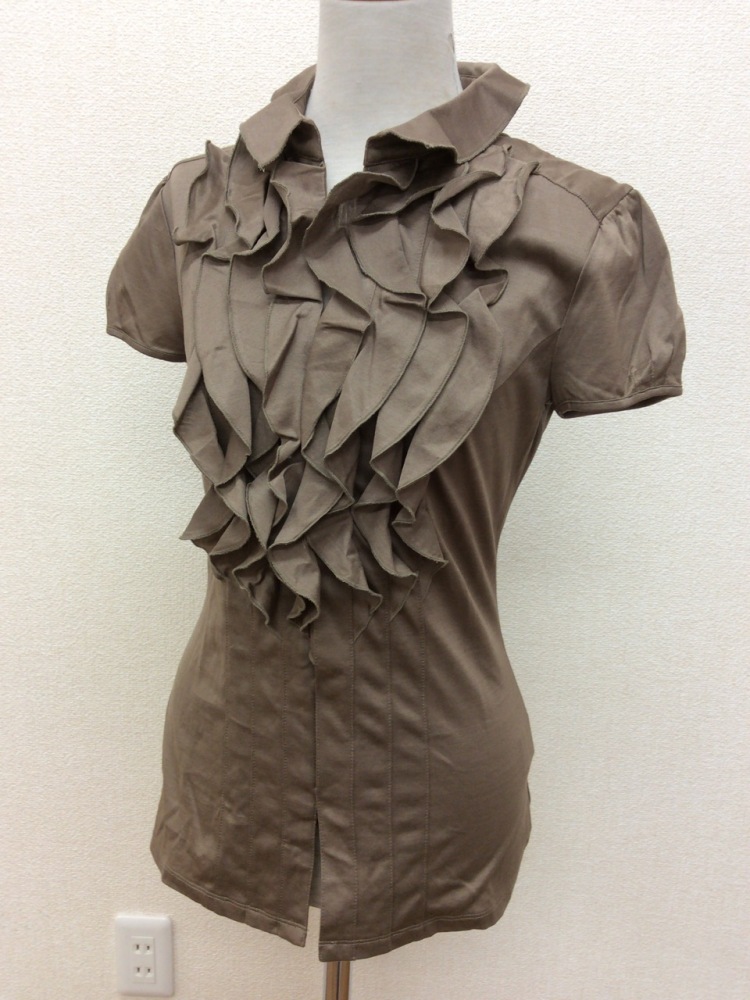  Materia mocha tea color. frill shirt button is inside side . appearance neat 