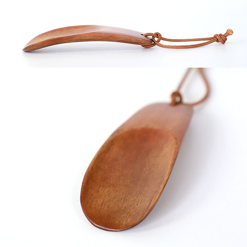  shoehorn portable natural tree made circle . mobile shoehorn lacquer coating stylish shoes bela shoes .. light weight smaller wood carrying finding employment .. work society person business large student Brown 