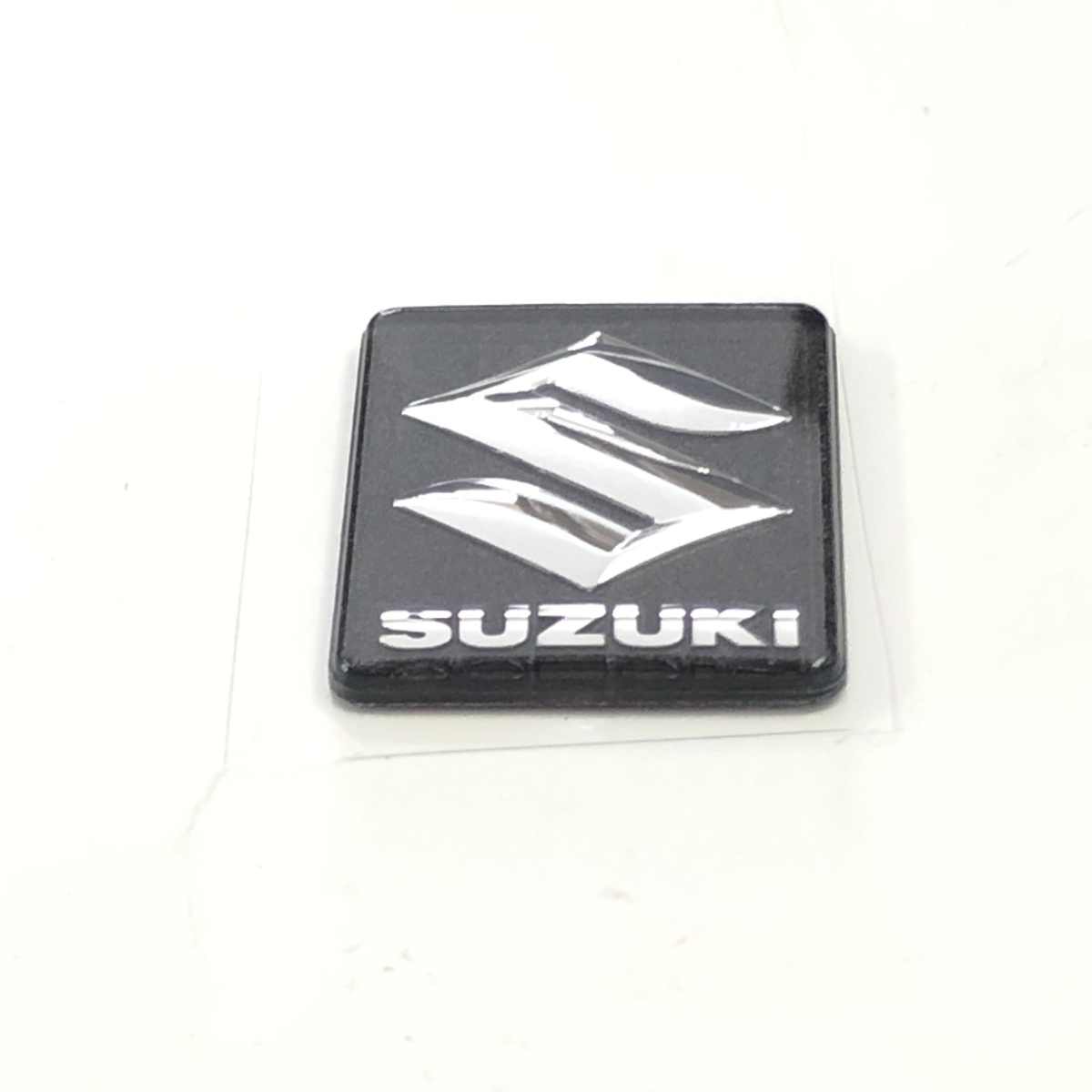 0 Suzuki эмблема верхняя скоба (top bridge) 