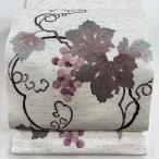 開き名古屋帯 美品 名品 落款あり 紬地 葡萄唐草 クリーム 正絹 中古