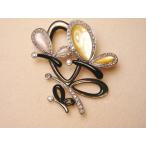 NB16:K18WG黄/白/黒蝶貝...