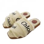 ショッピングchloe クロエ CHLOE WOODY シアリング サンダル フラット 37 白 /KH レディース