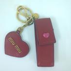 ショッピングMIUMIU MIU MIU リップケース キーリング付き ハートチャーム レッド ゴールドカラー