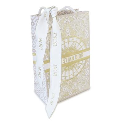 週末セール　国内正規品　ディオール ショッパー　紙袋　リポン付き　100枚 Dior - 《美品》Dior ディオール ショッパー 紙袋 リボン付き
