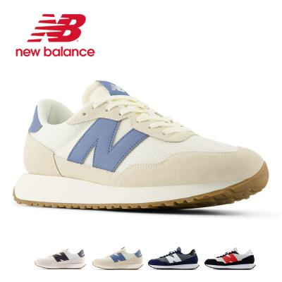 New Balance メンズスニーカー（色：オレンジ系）｜シューズ