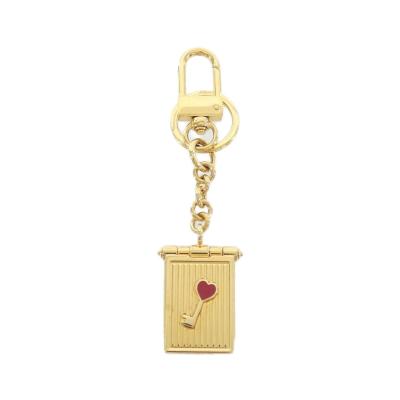 Cartier カルティエ ディアボロ ドゥ カルティエ フォトフレーム キーリング キーホルダー バッグチャーム ハート キー GP ゴールド CROG000467 楽天市場】Cartier カルティエ ちいさな写真が入るロゴ刻印フォト