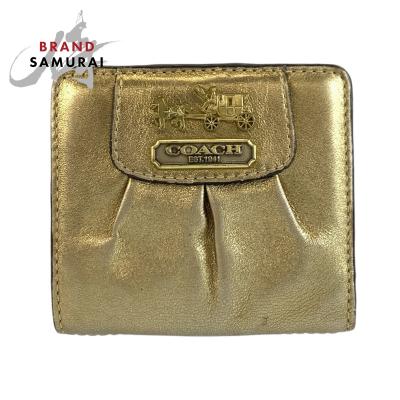 COACH レディース二つ折り財布（色：ゴールド系）｜財布｜ファッション