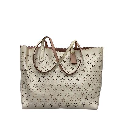 COACH レディーストートバッグ（柄：花柄、フラワー）｜バッグ