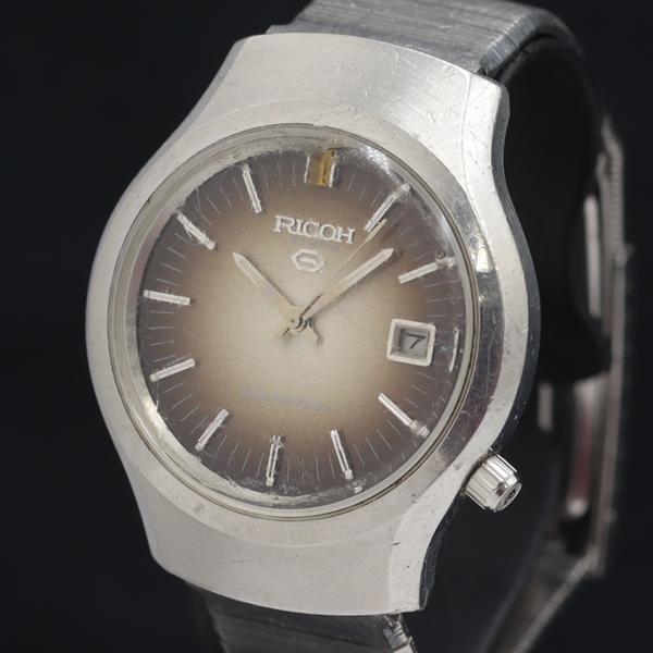 リコー  QZ 571001 デイト ブラック文字盤 メンズ腕時計 YUM 2000000 NSK