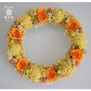 オレンジ色のバラ 黄色のソーラーフラワー 明るい元気なビタミンカラー