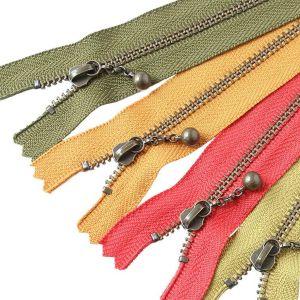 日本紐釦貿易 Y.K.K 玉付 ファスナー アンティークゴールド 20cm スカーレット 3GKB20-518