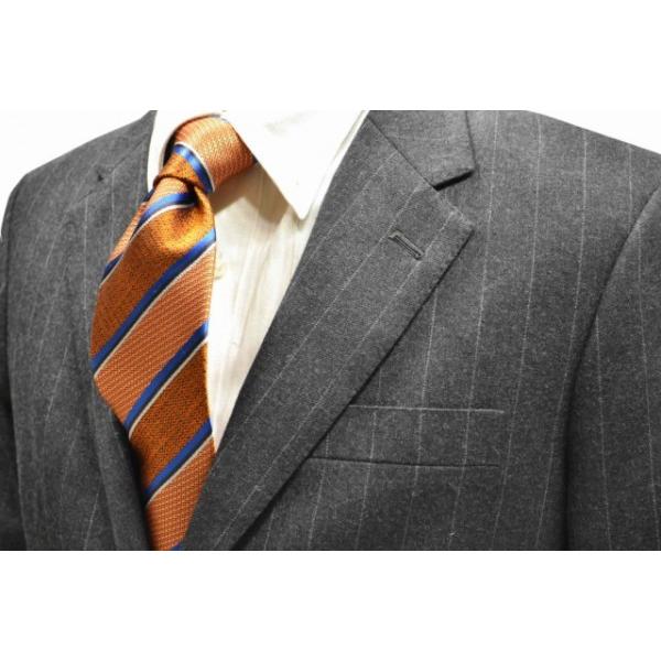 オレンジ地にブルー、ブラック、シルバーのストライプネクタイ/5%OFF/STN-19W007