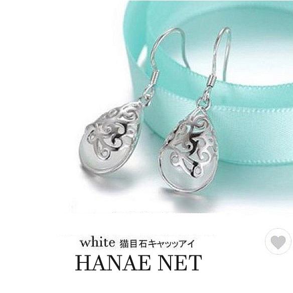 ピアス レディース 猫目石キャッッアイ アレルギー対応 ロングピアス 揺れる 白色 雫 ドロップ フ...