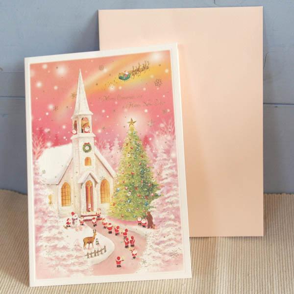 メルヘンクリスマスカード『夕暮れピンクに染まる白い教会に集まるサンタと森の動物』【ネコポス可】