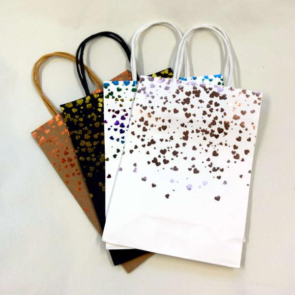 シーンで使い分ける手付き紙袋4枚、150x205x80mm。箔押でハートの吹雪。 ギフトバッグ ペー...