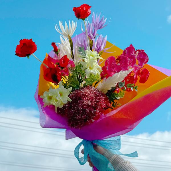 送料無料 ビビットカラー 韓国風 花束 ブーケ カラフル ラッピング 胡蝶蘭 ひまわり 送り花 プレ...