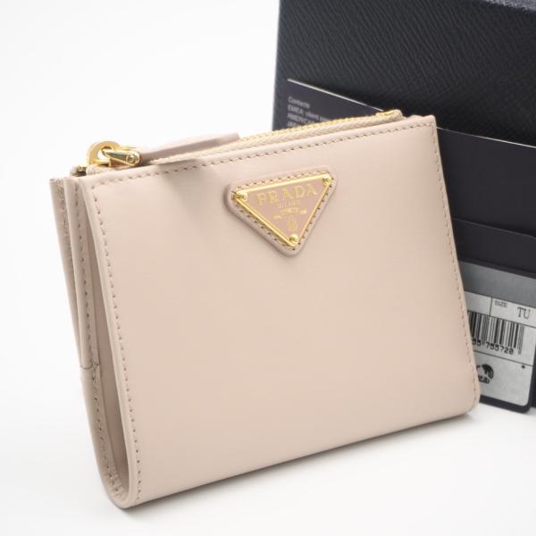 ★3日以内返品可★ 極美品 PRADA プラダ レザー トライアングルロゴ 二つ折り財布 1ML05...