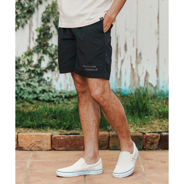 Cursive embroidery nylon swim shorts