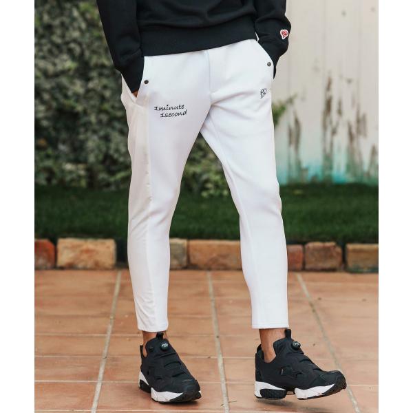 イージーパンツ cursive embroidery cardboard knit nylon pa...