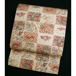 袋帯 未使用 膨れ織調 振り分け幾何学模様 豪華金糸金箔色糸織り込み  