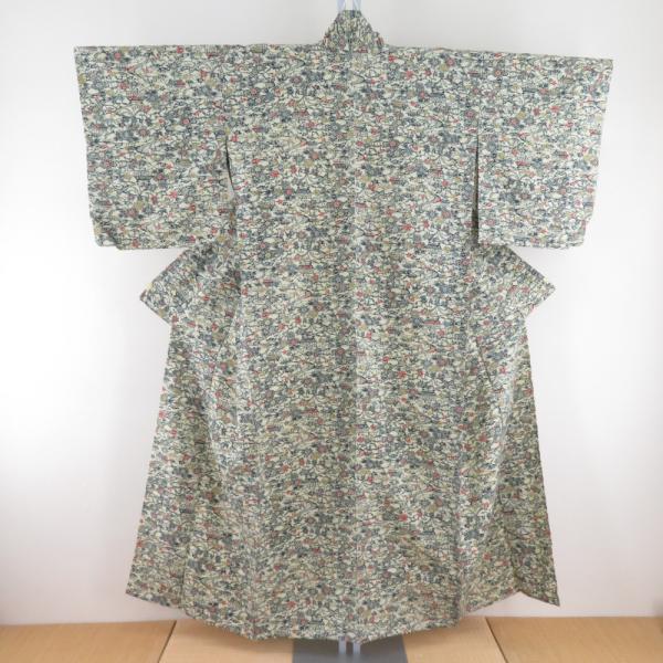 小紋 紬地 型染め 花に家屋文様 単衣 広衿 薄黄色 正絹 仕立て上がり カジュアル着物 身丈152...