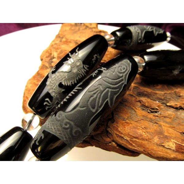 騎龍観音 オニキス天珠形 功徳利益を与える お買い得 騎龍観音彫刻オニキス天珠形 サイズ：約40mm...