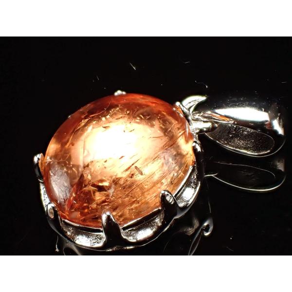 インペリアルトパーズ オーバル型 ペンダントトップ 石サイズ縦約11mm 王冠モチーフ金具タイプ 成...