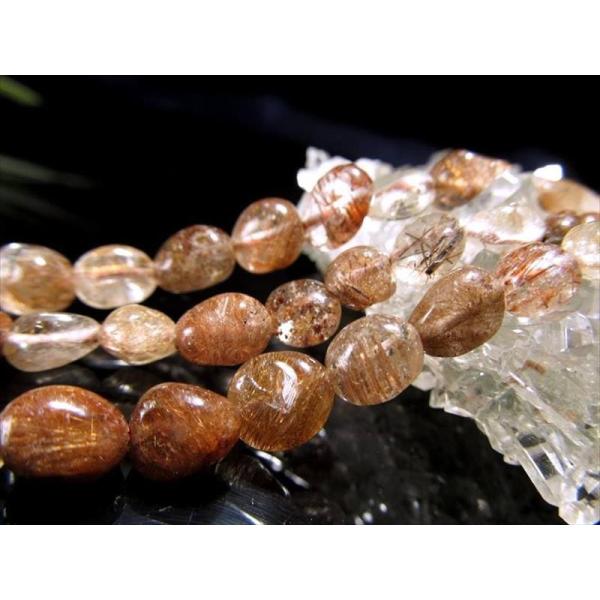 高品質入荷 お買い得 ブロンズルチルクォーツ 針入り水晶 タンブル 連 粒サイズ約4mm-8mm 一...