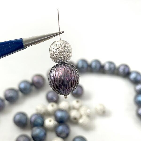 淡水パール （ラウンドカット） ブルーブラック 大きさ 約11〜12.5mm 穴径 約0.5〜0.6...