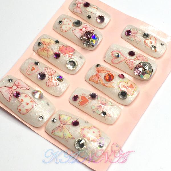 リボンとハートのメルヘンネイル ミルキーホワイト ネイルチップ by Kanna