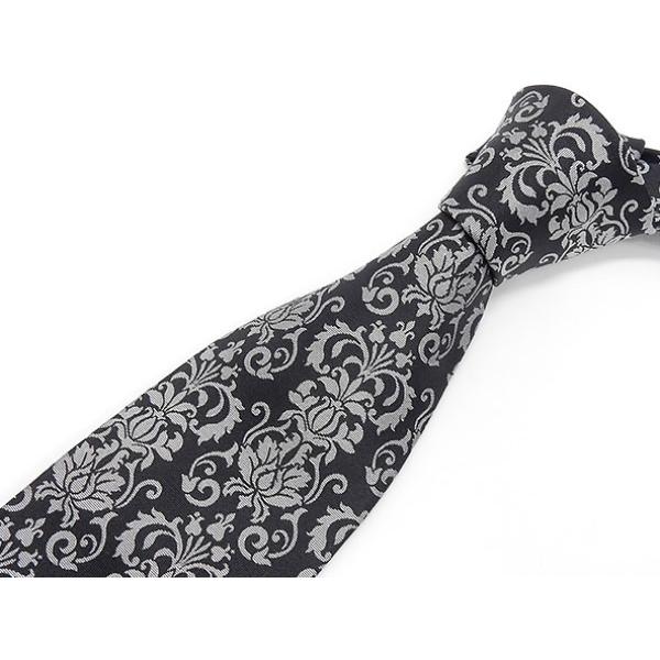 イタリー生地　日本縫製　ネクタイ　VACANZA　シルク100％　黒×銀　紋章