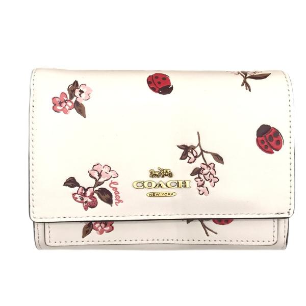 コーチ ★COACH★ ミディアム フラップ ウォレット ウィズ レディバグ フローラル プリント ...
