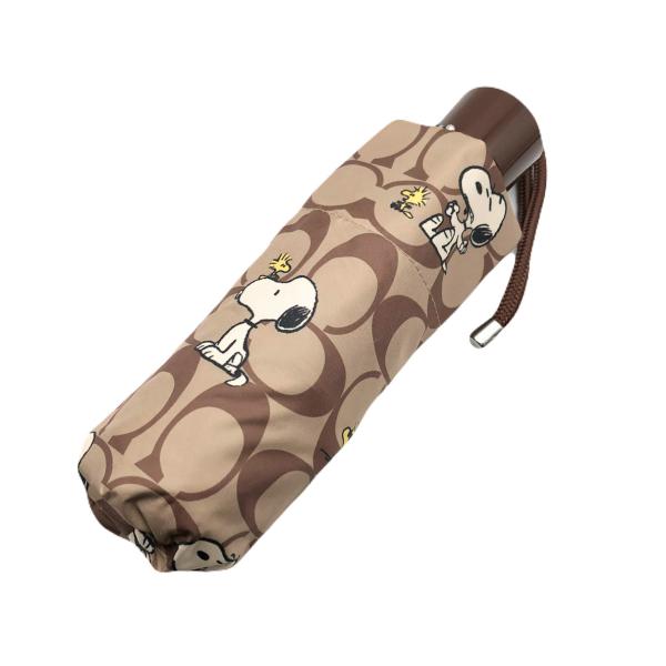 コーチ 折りたたみ傘 ★COACH★ UVプロテクション ミニ アンブレラ シグネチャー スヌーピー...