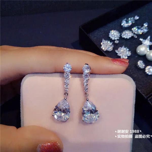 ピアス 白 ホワイト ジルコニア シルバー ドロップ ピック リング 木の葉 リーフ レディース 絶...