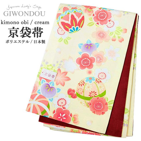 京袋帯 お太鼓 一重太鼓 | クリーム色 桜 橘 もみじ 鞠 紗綾型 地模様 草花 | リバーシブル...