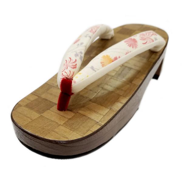 □　こだわりのお誂え逸品　□　　優しい小菊の型染め花緒に　　変わり格子組木の面貼り　桐下駄