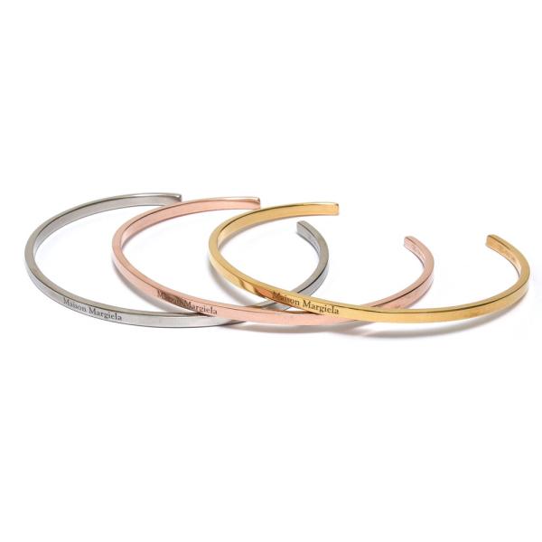 Maison Margiela（メゾン マルジェラ）スターリングシルバーロゴバングル SM1UY00...