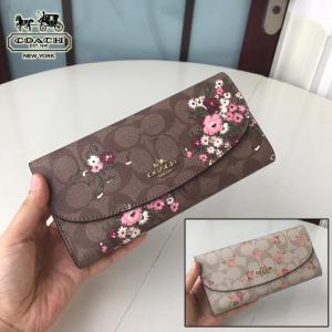 COACH コーチ コーティングキャンパス シグネチャー フローラル 花柄 スリム エンベロープ 二つ折り 長財布 カーキマルチ 31779