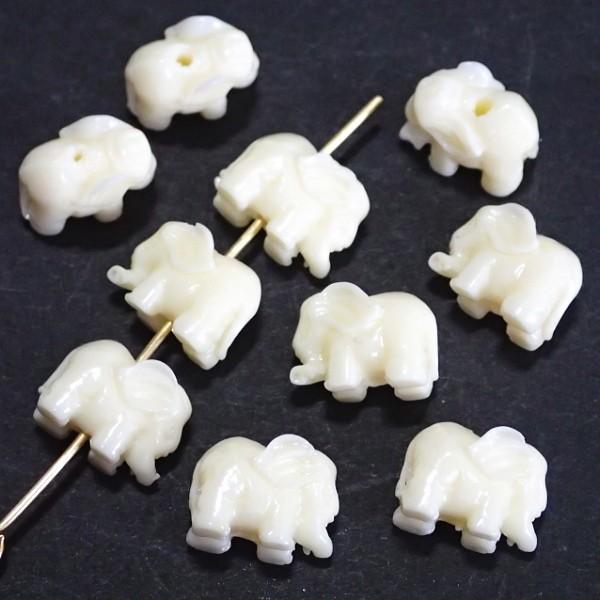 21723-【人造コーラル】　象　クリーム　縦ホール　８．５ｘ１２mm　１０個/１パック