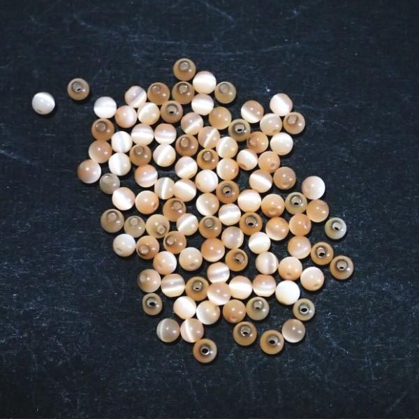 5283-〔キャッツアイ〕　ピーチ　２mm　１００個/１パック