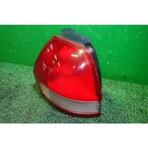 ウイングロード GF-WFY11 左テールランプ  コイト 220-24767 中古