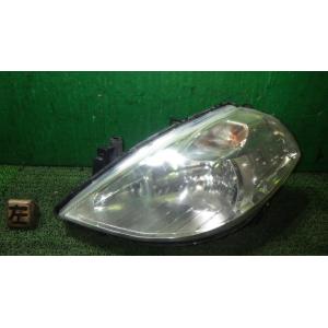 ティーダ ラティオ DBA-SC11 左ヘッドランプ STANLEY P7779 26060-1JY...