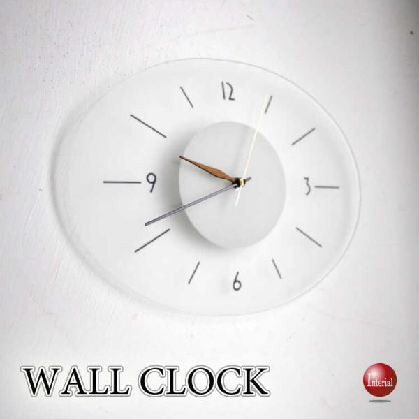 モダンな楕円形のフロストガラス製壁掛け時計 静かなスイープムーブメント 半透明 楕円形 モダン 寝室...