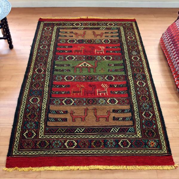 グチャン イランの手織りキリム 185x113cm ラクダとシカのモチーフ