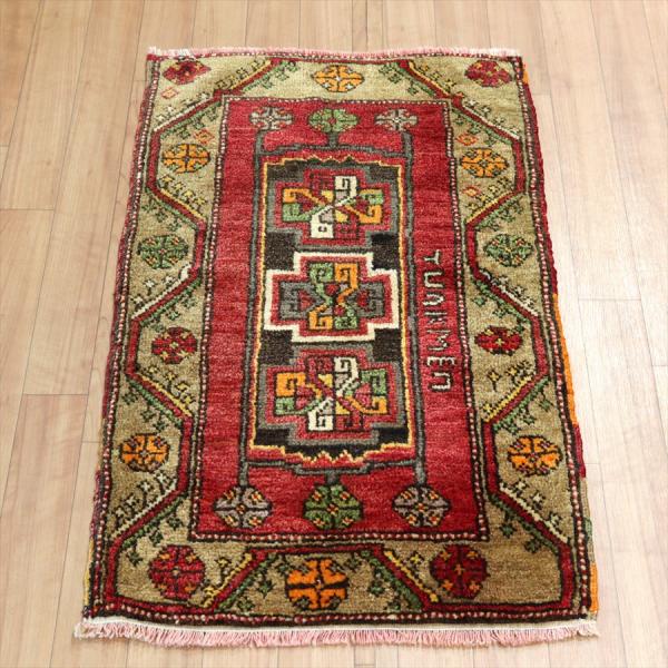 トライバルラグ トルコ シワス 88x53cm 風車のようなメダリオン 文字入り