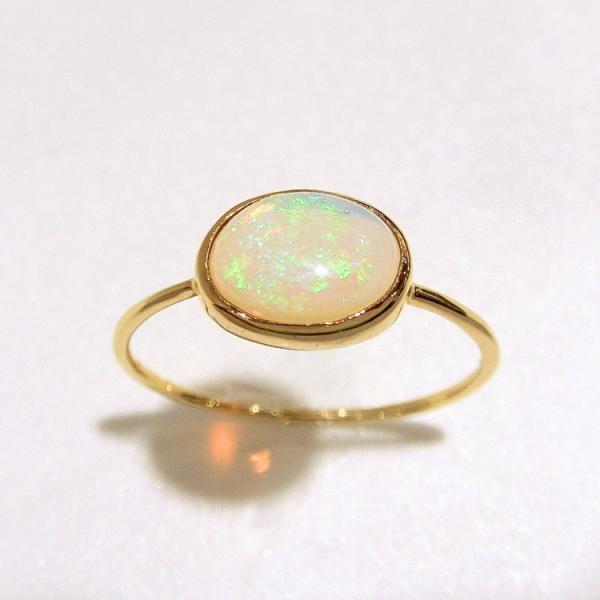 クリスマス プレゼント オパール 指輪 18金 K18 一粒 リング 天然石 オーバル 1石 12号...
