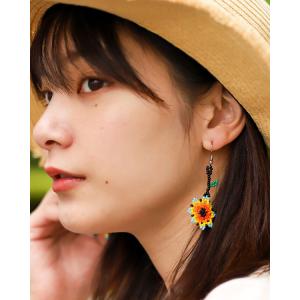 ヤマチャン　ほぼ新品　スワロフスキーSwarovski Niceピアス 羽 org.jpg