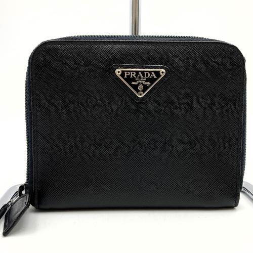 PRADA 財布 ラウンド財布 ブラック 黒 レザー 三角プレート ファスナー メンズ ウィメンズ ...